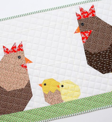 New Easters quilt patterns by Nadra Ridgeway of ellis & higgs. The Chicken Family table runner is the perfect decoration for breakfast on Easter Sunday! Download the free tutorial on my blog. The discounted pattern bundle, including the Hen quilt block, Rooster quilt block and Little Chickens quilt block is available in my Etsy Shop. Farm animal quilt, Easter crafts, Easter DIY project, pillow, mini quilt, sewing for baby. Easter Quilt Patterns, Easter Quilt, Farm Animal Quilt, Bird Quilts, Table Runner Tutorial, Chicken Quilt, Patchwork Blocks, Paper Piercing, Chicken Ideas