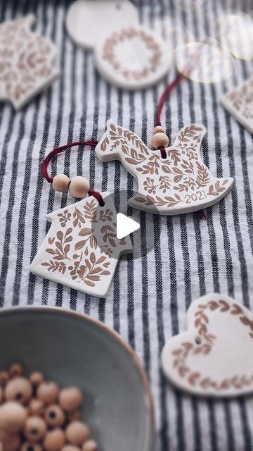 Shayda Campbell on Instagram: "Reposting my most popular reel because these air dry clay ornaments are so pretty and SO SO easy to make! If you have toddler hands helping to decorate this year, then I recommend using porcelain air dry clay if you can find it. It sort of looks like dried white glue, so once dry, you have to paint them white and then add the designs, but they will not break when dropped! Full tutorial on my YouTube channel if you’re looking for more info! ❤️" Natal, Fimo, Dry Clay Ornaments, Air Dry Clay Ornaments, House Arrangement, Shayda Campbell, Salt Dough Projects, Hands Helping, Salt Dough Christmas Ornaments