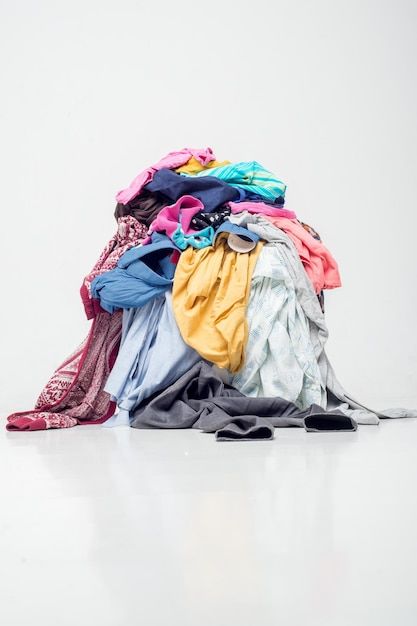 Photo pile of used clothes on a light ba... | Premium Photo #Freepik #photo #landfill #dump #waste #rubbish What Is Fast Fashion, Pile Of Clothes, Throwing Clothes, Fashion Documentaries, Professional Organization, Recycled Clothes, Hand Photo, Concept Photos, Graphic Design Lessons