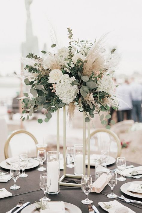 Jun 21, 2021 - A modern, tall centerpiece of eucalyptus, white blooms and pampas grass Eucalyptus Centerpiece, Lux Wedding, Tall Wedding Centerpieces, Tafel Decor, Grass Wedding, Wedding Floral Centerpieces, Tall Centerpieces, Wedding 2025, Eucalyptus Wedding