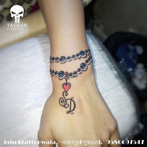 TashanTattoo
AshokTattooWala
S.20. Tirupati plaza
Opp. New bus stand
Near gd modi collage
Palanpur (gujrat)
9586697547
9687533310 Pearl Bracelet Tattoo Wrist, Blue Bracelet Tattoo, Hand Bracelet Tattoos For Women, Charm Bracelet Tattoo For Women, Bracelets Tattoos For Women, Ankle Bracelet Tattoo With Names, Small Name Tattoos On Wrist, Infinity Bracelet Tattoo, Name Bracelet Tattoo