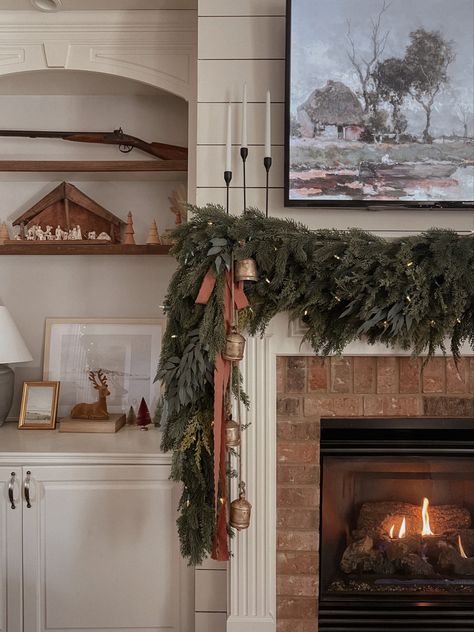 Built In Christmas Decorations, Muted Christmas Ornaments, Vintage Christmas Fireplace Mantle, Christmas Craftsman Home, Christmas Garland Aesthetic, Garland And Stockings On Fireplace, Magee And Co Christmas, Christmas Stocking On Mantle, Bay Window Garland Christmas