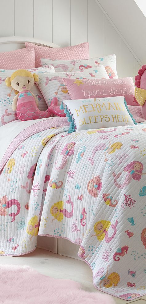 The Levtex Home Marina Twin Quilt Set includes one twin quilt and one standard sham in pink, white colors. The Marina collection features mermaids, seahorses, and other sea life motifs to make your little girl's room feel fun and imaginative. #girlsbedding #girlsrooms #mermaids #kidsrooms #kidsbedding Whimsical Bedding, Mermaid Quilt, Mermaid Bedding, Ideas Habitaciones, Mermaid Bedroom, Mermaid Room, Cotton Quilt Set, Mermaid Decor