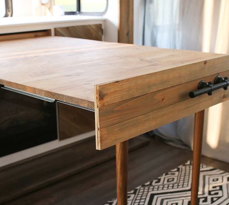 We’re obsessed with this space-saving DIY expandable table that's hidden when not in use, but transforms into a desk or table in under a minute! #rvrenovation #rvreno #expandingtable #diydesk #transformingtable #tabledesign #modularfurniture #rvinspiration #campermakeover #hiddentable #drawertable #tinyhomeideas Murphy Style Dining Table, Slide Out Table Camper, Slide Out Dining Table, Hidden Folding Table, Tiny House Table Ideas, Dropleaf Tables Diy, Pull Out Table From Cabinet, Murphy Table Diy Small Spaces, Hidden Table In Cabinet