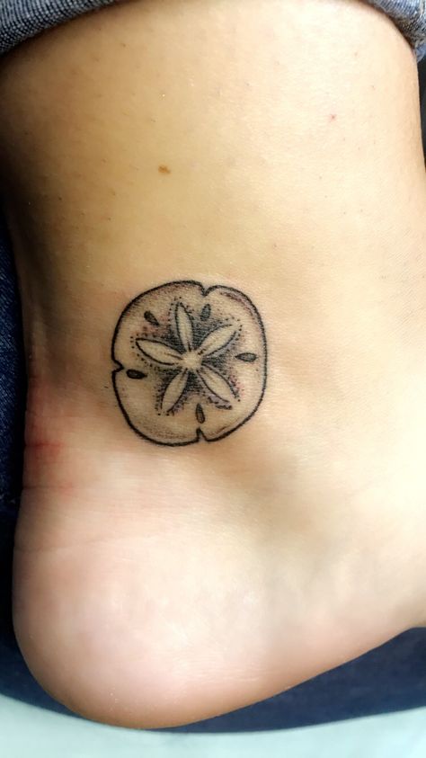 Starfish And Sand Dollar Tattoo, Sand Dollar Tattoo Ideas, Sea Dollar Tattoo, Sand Dollar Tattoo For Women, Matching Seashell Tattoos, Superstitious Tattoo, Small Sand Dollar Tattoo, Beach Foot Tattoo, Ocean Beach Tattoo