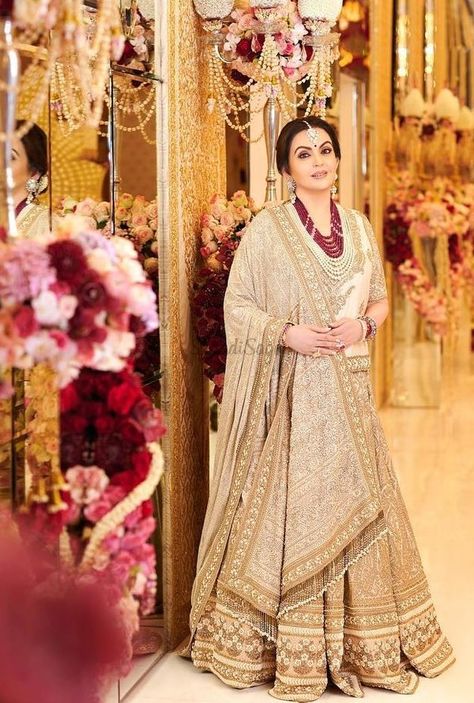 Mother Of The Bride & Groom: Outfit Inspo From Celebrity Mothers! | ShaadiSaga Nita Ambani Lehenga, Sabyasachi Outfits, Shloka Mehta, Akash Ambani, Mehandi Outfits, Ambani Wedding, Sabyasachi Bridal, Celebrity Inspired Outfits, Nita Ambani