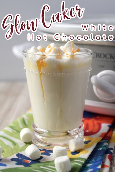 Slow Cooker White Hot Chocolate - A great way to make a big batch of white hot chocolate for a group! Creamy white hot chocolate cooked in a crockpot and topped with mini marshmallows. White Hot Chocolate Recipe | Slow Cooker White Hot Chocolate | Crock Pot White Hot Chocolate Pioneer Woman White Hot Chocolate, Slow Cooker White Christmas Hot Chocolate, Chocolate Peppermint Martini, Crock Pot Hot Chocolate Recipe, White Hot Chocolate Recipe, Peppermint Martini, White Chocolate Sauce, Crockpot Hot Chocolate, White Chocolate Peppermint