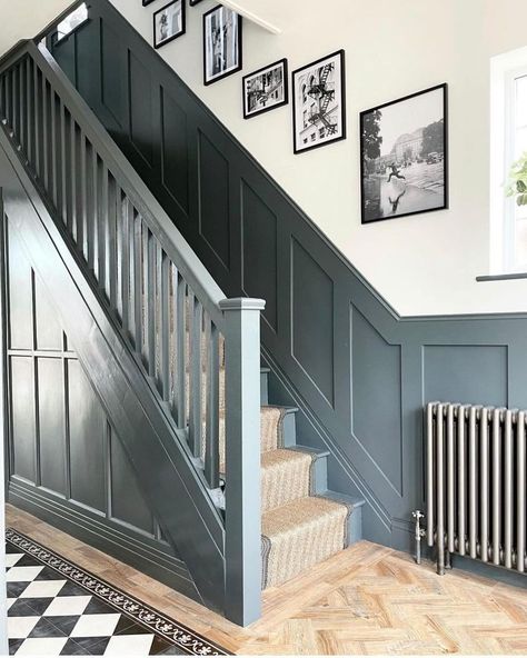 Panelling On Side Of Stairs, Wooden Panelling Staircase, Dark Paint Staircase, Dark Grey Half Wall Panelling Hallway, Stair Panelling Colour, Panelling Up Staircase, Banisters And Railings Paint Ideas, Dark Blue Stairway, Navy Banister Stairways