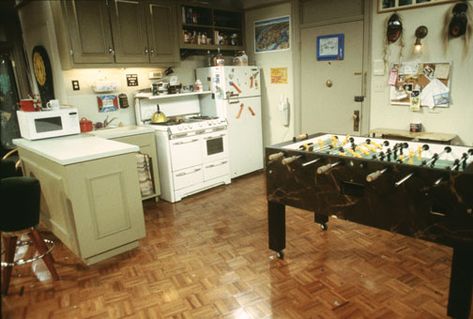 Chandler and Joey's apartment is located in Greenwich Village in Manhattan. The apartment served... Joey Chandler, Friends Apartment, Friends Scenes, Ross Geller, Foosball Table, New York City Apartment, Phoebe Buffay, Linoleum Flooring, Chandler Bing