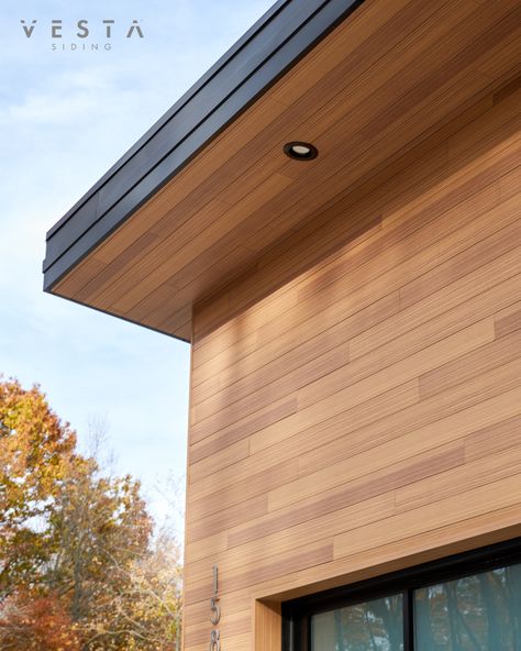 Warm-tone Gilded Grain Vesta was added to the exterior of this garage gravitating it toward a Mid-Century Modern design. To achieve this look on a variety of architectural styles, opt for Vesta siding with smooth profiles, and use a maximum of two orientations. This keeps things very streamlined and simple. Wood Siding Modern House, Vertical Cement Board Siding, Modern Home Siding, Diagonal Wood Siding Exterior, Modern Cedar Siding, Wood Soffit Exterior Modern, Wooden Soffit Exterior, Wood Looking Siding Exterior, Contemporary Siding Exterior