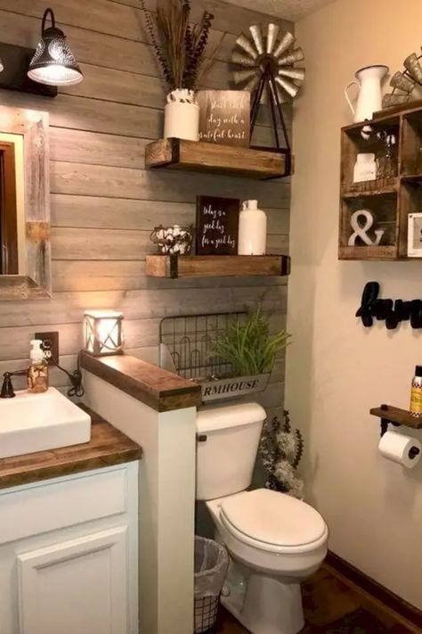 Transform your tiny bathroom into a rustic haven without spending a fortune! 🌿✨ Dive into our treasure trove of budget-friendly rustic bathroom ideas. From charming upcycled vanities to handmade decor, discover how to create a cozy, cabin-like ambiance in even the smallest spaces. Perfect for DIY enthusiasts and decor lovers seeking a mix of style and practicality. Pin now to inspire your next bathroom makeover! #RusticBathroom #BudgetDecor #DIYHomeProjects #SmallBathroomDesign" Small Rustic Bathroom Ideas, Small Rustic Bathroom, Makeover Kamar Mandi, Western Bathroom, Country Bathroom Decor, Rustic Farmhouse Living Room, Rustic Bathroom Designs, Farmhouse Remodel, Country Bathroom