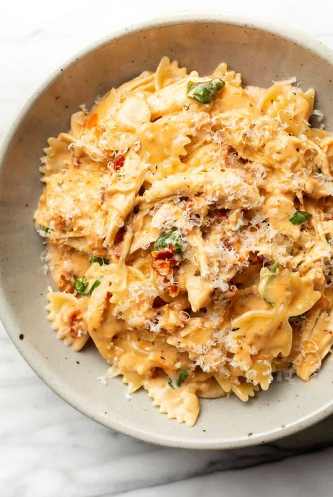 For a special yet easy and quick meal, this marry me chicken pasta recipe hits the spot! It has a crave-worthy garlic, parmesan, and tomato sauce with a splash of white wine. Marry Me Chicken Pasta Salt And Lavender, Dinner Recipes Pasta Healthy, Good Meal Recipes, Easy Dinners For Family Of 3, Super Cheap Dinner Recipes, Chicken Based Dinners, Creamy Pasta And Chicken Recipes, Creamy Farfalle Pasta Recipes, Trader Joe's Pasta Recipe