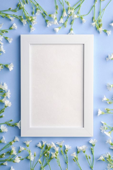 White empty photo frame with mouse-ear c... | Premium Photo #Freepik #photo #flower #frame #floral #photo-frame Flowers On Blue Background, Empty Picture Frames, Pink Spring Flowers, White Photo Frames, Photo Frame Wallpaper, Instagram Photo Frame, Picture Frame Shelves, Picture Frame Decor, Photo Frame Design