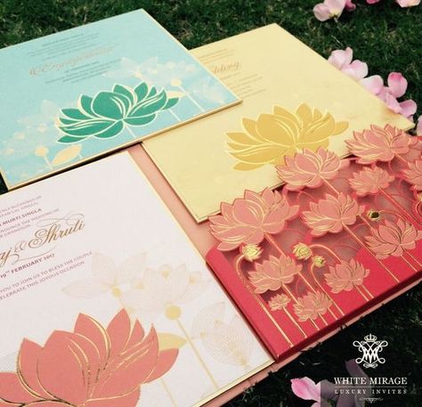 3D wedding invite | pink yellow and green illustrated lotus with gold accents | Indian Wedding Invitation Ideas| Credits: White Mirage Luxury Invites | Every Indian bride’s Fav. Wedding E-magazine to read. Here for any marriage advice you need | www.wittyvows.com shares things no one tells brides, covers real weddings, ideas, inspirations, design trends and the right vendors, candid photographers etc. Pastel Wedding Invitations, Indian Invitations, Wedding Card Design Indian, Indian Wedding Invitation Card Design, Unique Wedding Cards, Indian Wedding Invitation Cards, Indian Wedding Cards, Trendy Wedding Invitations, Wedding Indian