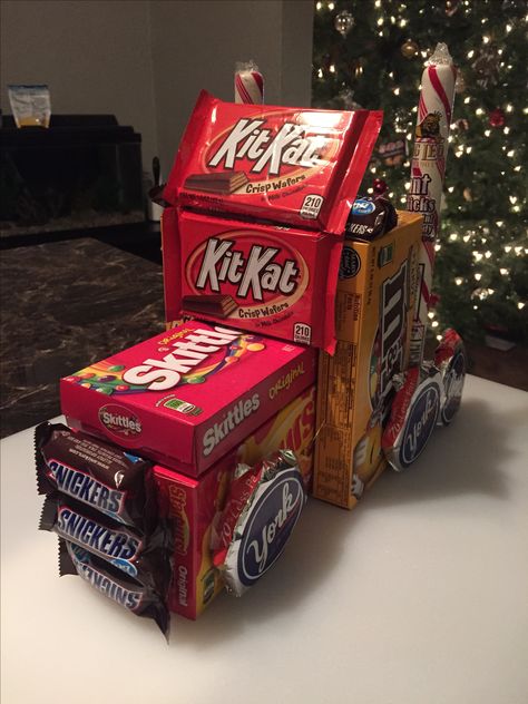 Semi truck made of candy. Dollar store candy boxes and candy canes hot glue gunned together Semi Truck Decorations Ideas, Truck Driver Party Ideas, Driver Appreciation Ideas Truck, Semi Truck Made Out Of Candy, Truck Driver Gifts Ideas, Semi Truck Party, Candy Truck, Christmas Candy Crafts, Desert Party