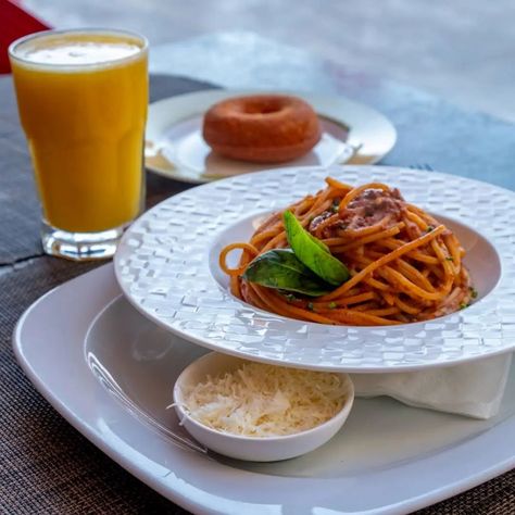 Who says orange juice is just for breakfast? This refreshing drink might just be the perfect complement to a plate of spaghetti. #spaghetti #orangejuice #brunch #breakfast #foodphotography #instafood #wackyfoodcombos Orange Juice, Refreshing Drinks, Juice, Spaghetti, Food Photography, Orange, Drinks