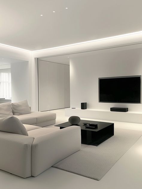 The combination of large-screen TV with black subwoofer and audio equipment,
It shows the fashion and practicality of modern home.
The overall color matching is harmonious and unified,
Without losing modernity,
It also creates a warm and comfortable living atmosphere. Modern Gray And White Living Room, White And Grey House Aesthetic, Minimalist And Modern Living Room, Home Interior Design Apartments, Monochrome Living Room Ideas, Light Gray Aesthetic, All White Living Room, Color In Interior Design, Light Interior Design