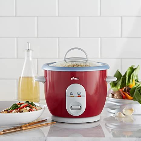 Holds 3 cups of dry rice. Prepares up to 6 cups of #cooked #rice; Cord length: 28 inches Compact rice #cooker with one #touch #controls #ideal for rice, #soul, fondue, and more 1 liter #vegetable #steamer #tray to cook vegetables, #fish, and more Tempered #glass #lid lets you check on food as it cooks. Includes #measuring #cup and non scratch rice #paddle #spoon #Automatic keep #warm feature keeps rice #hot; #auto #shut off #prevents #food from #burning Kitchen Electronics Appliances, Appliance Logo, Cook Vegetables, Best Rice Cooker, Slate Appliances, Vintage Kitchen Appliances, Best Rice, Smeg Appliances, Kitchen Appliance Storage