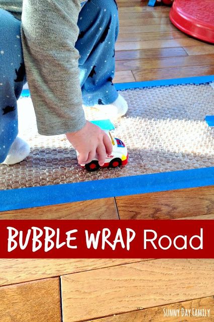 Make a road with bubble wrap and tape! Truck loving toddlers will have hours of fun popping along this super easy road - a perfect indoor activity for toddlers! Boat Art For Toddlers, Indoor Sensory Play, Cognitive Activities For Toddlers, Indoor Activity For Toddlers, Babysitting Kit, Transportation Activities, Car Activities, Aktiviti Kanak-kanak, Indoor Activities For Toddlers