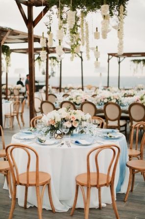 Something Blue, rustic beach wedding reception with pastel floral centerpiece and dusty blue table setting at Grand Velas Los Cabos in Los Cabos, Mexico. Brought to life by Florist- Elena Damy, Photographer- Joseph West Photography and Planner- Belle of the Ball. Round Table Centerpieces Wedding, Table Runner Round Table, Round Table Settings, Floral Walls, Round Wedding Tables, Blue Table Settings, Cabos Wedding, White Round Tables, Baby Blue Weddings