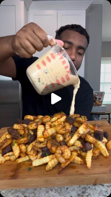 🧬Helping You Unlock the Best Version of Yourself on Instagram: "Loaded Surf & Turf Fries! 🍤🥩 
.
. credit goes to ⤵️
🎥 : @eatwitzo 
.
.

I was thinking of new appetizers I wanted to try and this is now my new favorite! Make it immediately 😂

Full ingredient list: 

1-2 lb steak cubed (ny strip or sirloin) 
1 lb large shrimp 
1-2 tsp chili powder
1-2 tsp dried oregano 
1-2 tsp onion powder 
1-2 tsp black pepper
1-2 tsp salt (optional) 
*Use separate seasoning amount for steak & shrimp* 
For fries: 
6-8 large russet potatoes peeled 
Large ice water bath 
Directions- 
1. Cut fries and add to water bath to soak for At least 30 minutes (to remove all starch) 
2. Pat fries dry and bring oil to 300 F and fry for 5-6 minutes until fully cooked. 
3. Set aside and bring oil to 375 F. Fry for ano Loaded Steak Fries Recipes, Steak Loaded Fries, Loaded Steak Fries, Fries With Steak, Surf And Turf Recipes, New Appetizers, Surf N Turf Recipes, Steak And Fries, Loaded Fries Recipe