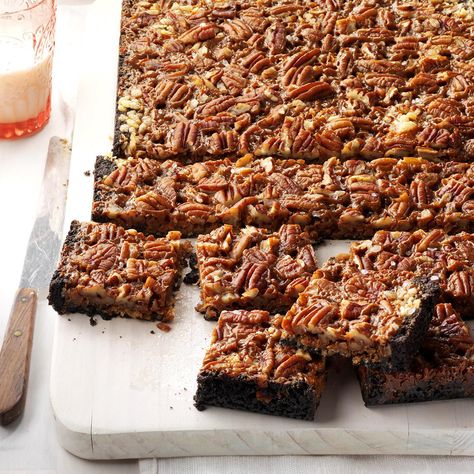 Not Your Mama's Seven-Layer Bars Recipe -The addition of dulce de leche makes this a decadent new take on traditional seven-layer bars. You can cut this recipe in half and make it in an 8x8-in. pan. —Andrea Barlow, Hot Springs, Arkansas Packaged Cookies, Seven Layer Bars, Magic Cookie Bars, Easy Easter Desserts, Layer Bars, Potluck Desserts, Bakery Items, Fudgy Brownie, Pecan Pie Bars