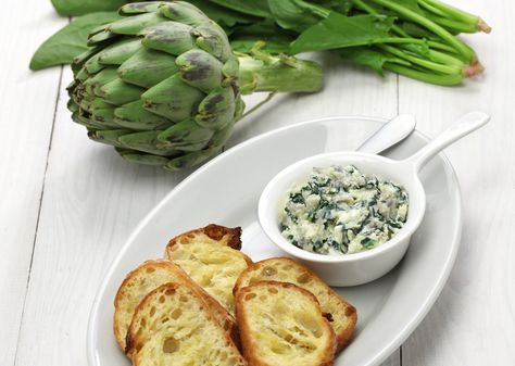 This creamy spinach and fresh artichoke dip recipe will definitely be the hit of your next summer evening get-together. Greek yogurt adds nice thickness and sautéed spinach adds depth of flavor, while fresh green onions round out the flavor profile. Slow Cooker Spinach Artichoke Dip, Fresh Artichoke, Spinach Dip Easy, Slow Cooker Appetizers, Crock Pot Dips, Artichoke Dip Recipe, Sauteed Spinach, Amazing Appetizers, Spinach Artichoke Dip