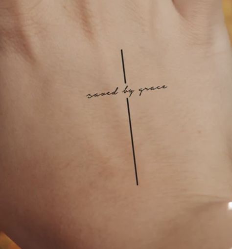 Small Wrist Tattoos For Women Christian, Minimalist Tattoo About God, Behind The Ear Christian Tattoo, Tattoo Ideas Female Small Meaningful God, Faithful Tattoos For Women, Cross Verse Tattoo, Bible Verse Minimalist Tattoo, Cross And Wave Tattoo, Cross With Names Tattoo Design