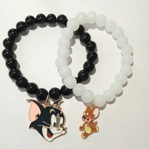 Tom and Jerry couple Bracelets / Best friend bracelets 🖤🤍 (Set of 2) Buy one for your Tom / Jerry and let them know you have unbreakable bond 🪄🤝 doesn't matter how much you fight or argue or show arrogance, you both know that spark will always remain✨ #tomandjerry #tomandjerrybracelet #charmbracelets #tomandjerrypics #tomandjerrylovers Tom And Jerry Couple, Tom N Jerry, Tom And Jerry Pictures, Tom Y Jerry, Best Friend Bracelets, Tom Jerry, Bead Charms Diy, Friend Bracelets, Beads Bracelet Design