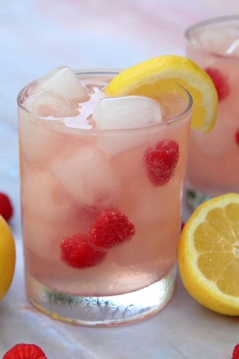 Raspberry Lemonade Vodka Spritzer | System of a Brown Raspberry Lemonade Vodka, Limoncello Cocktails, Coctails Recipes, Raspberry Vodka, Vodka Lemonade, Lemonade Cocktail, Refreshing Summer Cocktails, Spring Cocktails, Pink Cocktails