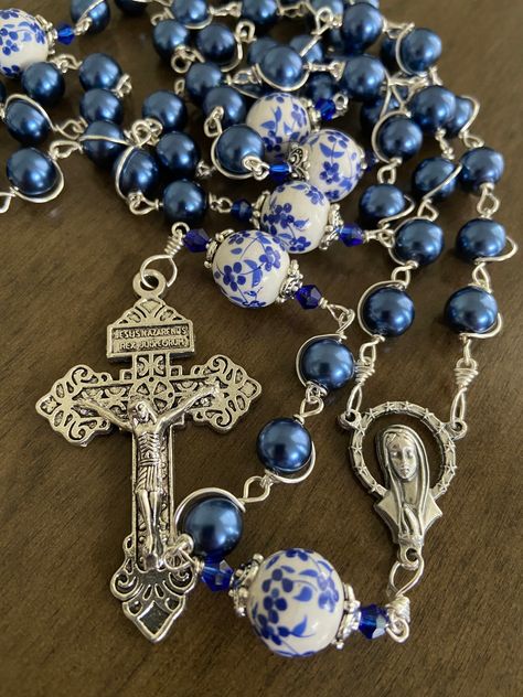 "This beautiful handmade rosary is made with 8mm blue glass, 10mm ceramic beads and 2\" Pardon crucifix. Length: 20\" inches long" Rosary Hand Made, Blue Spiritual Rosary As A Gift, Rosary Ideas, Handmade Blue Rosary With Cross, Handmade Blue Rosary With Cross Shape, Blue Healing Rosary, Rosary Prayers Catholic, Rugged Rosary, Blue Rosary