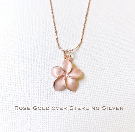 "18K Gold over Sterling Silve 925 plumeria necklaces. They are finely-detailed, high-quality, and very precious. The petals are sparkly sandblasted with polished edges. Pendant size is 20 mm (13/16\"). Also available in Sterling Silver and Rose Gold over Sterling Silver. 18K over Sterling Silver 925 chains are available in three designs, seen in the picture above. The length can be adjusted from 18\" to 20\". For more plumeria earrings and necklaces: https://www.etsy.com/shop/NLMSilverAndStone?r Diamond Cross Necklace Gold, Silver Necklace Designs, Hawaiian Necklace, Silver Jewelry Cleaner, Jewelry Flower, Bracelet Charms, Diamond Cross Pendants, Gold Diamond Earrings, Rose Gold Jewelry