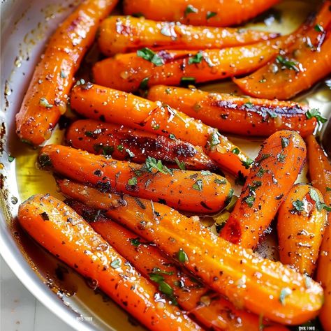 Elevate your side dish game with these Honey Garlic Butter Roasted Carrots, a delectable blend of sweet honey, savory garlic, and rich butter that transforms ordinary carrots into a culinary masterpiece. This easy-to-make recipe is ... READ MORE Cooked Baby Carrots, Sweet Baby Carrots, Butter Roasted Carrots, Carrots In Oven, Roasted Baby Carrots, Baby Carrot Recipes, Honey Carrots, Carrots Side Dish, Roasted Carrots Recipe