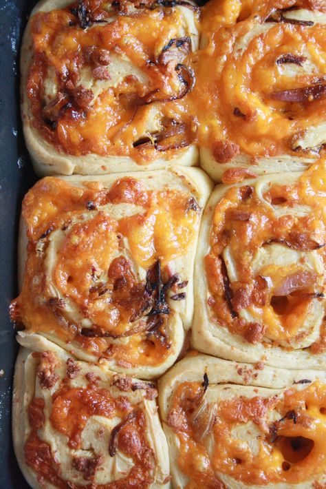 Soft and fluffy savoury rolls filled with orange cheddar and caramelised onions! Savory Brioche Rolls, Recipes Using Lots Of Onions, Carmelized Onion Bread, Bakery Lunch Ideas, What To Do With Extra Onions, Savory Madelines, Carmalized Onion Recipes, Melty Mashups, Savory Brioche