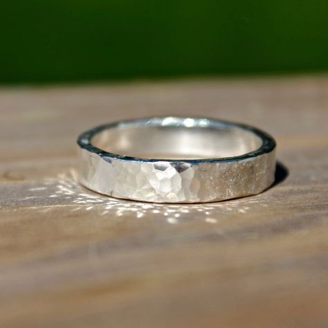 These Hammered bands in silver are perfect for Wedding bands or everyday wear. Great for Men and Women, these bands are handmade to order in your size using traditional metal smithing techniques. I have given the ring a lightly hammered textured finish for a classic yet rustic look with a high shine finish. Measures: 5mm Photos show High Shine and three rings to show how each ring is a little unique! Material: Silver (.925). All materials are hypoallergenic. These Rings are designed and handcraf Hammered Man Ring, Hammered Silver Ring Men, Hammered Silver Wedding Band, Silver Rings For Women Band, Men's Rings Silver, Wedding Ring For Men Silver, Metal Rings For Men, Best Ring For Men, Silver Ring Design For Men Unique