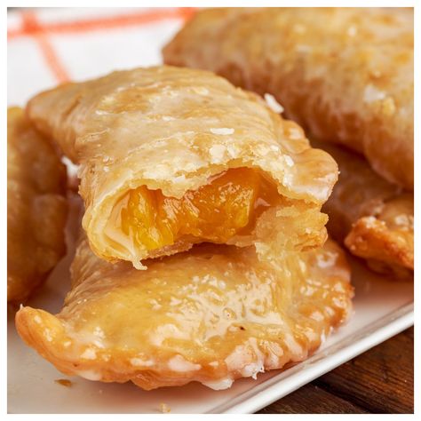 Peach Hand Pies Mango Pie Recipe, Weekend Desserts, Weeknight Desserts, Fried Peach Pies, Peach Hand Pies, Peach Mango Pie, Mini Cherry Pies, Portable Dessert, Mango Pie