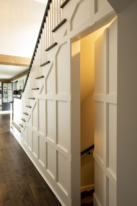 Door Leading To Basement, Kitchen With Staircase In The Middle, Under The Stairs Entryway, Exposed Wood Stairs, Wainscoting Secret Door, Staircase Next To Front Door, Staircase Design Basement, Stairs Under Stairs, Stairs By Kitchen