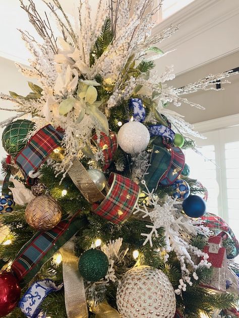 Flocked Tree With Traditional Ornaments, Red Gold Navy Christmas Tree, Navy Tartan Christmas, Chinoiserie And Plaid Christmas Tree, Blue Red Silver Christmas Tree, Blue Tartan Christmas Tree, Royal Stewart Tartan Christmas, Tartan Plaid Christmas Tree Ideas, Tartan Ribbon Christmas Tree