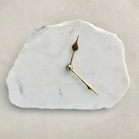 Tell time in style with this one-of-a-kind hand-chipped white marble clock. #oneofakind #deskdecor Shop now a timepiece as unique as you are. . . . . . #marblehomedecor #handmadeclock #giftideas #officestagram #homeofficedecor #modernclock #timeisprecious #personalizedhome #AanthropologyByRhea White Marble Desk, Horse Balloons, Marble Clock, Marble Desk, Desk Wall, Handmade Clocks, Modern Clock, Marble Slab, Gold Brass