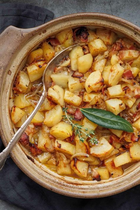 Potatoes boulangere garnished with a bay leaf and thyme in a ceramic pot created from the wildly successful cookbook "French Cooking Academy: 100 Essential Recipes for the Home Cook". To celebrate, we are excited to share three exclusive recipes with you – perfect if you’re looking for a sophisticated alternative menu to serve for any special occasion. Boulangere Potatoes, French Delicacies, Cooking Bacon, French Dishes, French Cooking, Food Writing, Culinary School, Smoked Bacon, Slow Cooked