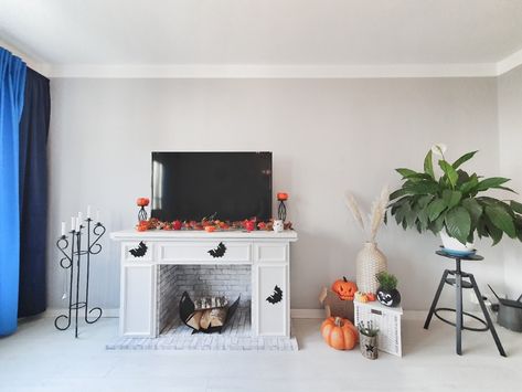 I started this project because I've always wanted a mantle for hanging Christmas stockings. Et voilà! Here it is -- the IKEA faux fireplace mantel. Fireplace Ikea Hack, Fake Fireplace Diy, Faux Fireplace Mantel, Ikea Kitchen Planning, Blue Grey Living Room, Brick Pattern Wallpaper, Ikea Kitchen Planner, Faux Fireplace Mantels, Fake Fireplace