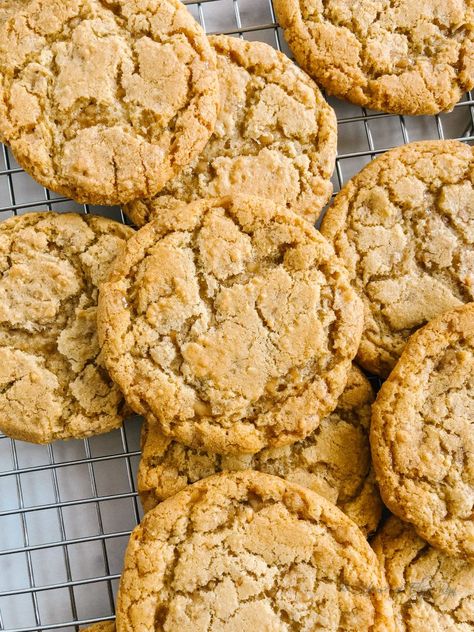 Stacked cookies on a cooling rack. Bits O Brickle Cookies, Maple Toffee Cookies, Cookies Using Toffee Bits, English Toffee Bits Recipes, Cookies With Toffee Chips, Sticky Toffee Cookies, Chewy Toffee Cookies, Brown Sugar Toffee Cookies, Toffee Chip Cookies Recipe