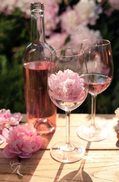 Table In Garden, Beautiful Peonies, How To Attract Customers, Wooden Table, Wooden Tables, Rose Wine, Peonies, Wine Glass, Alcoholic Drinks