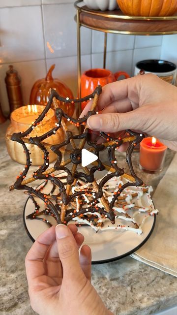 Sheri Wilson on Instagram: "Spooky Spiderwebs 🕸️🍫 these were so easy to make and perfect if you’re like me and love a sweet and salty combo! 

-pretzel sticks
-melting chocolate, white or dark
-Halloween sprinkles

Place 8 pretzels onto parchment paper in a star shape.
Melt the chocolate wafers according to the package directions, then pipe onto the pretzels to look like spiderwebs. Cover in sprinkles before the chocolate has set. 

#halloweentreats #halloweencountdown #halloweenvibes #halloweenaesthetic #halloweenfood #spookyseason #spookytreats #autumnmood" Star Shaped Snacks, Halloween Candy Melt Ideas, Spider Web Pretzels, Spiderweb Pretzels, Chocolate Pretzels Halloween, Spooky Sprinkle, Fall Finger Foods, Sheri Wilson, Halloween Desserts Easy