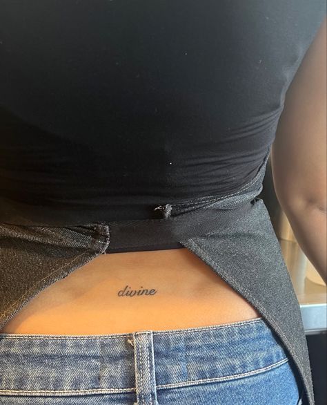 Back Tattoos Elegant, Lower Back Small Tattoos For Women, Cute Simple Tramp Stamps, Divine Lower Back Tattoo, Stamp Stamp Tattoo, Minimal Lower Back Tattoo, Name Back Tattoo For Women, Lower Back Tattoo Aesthetic, Trampoline Stamp Tattoos