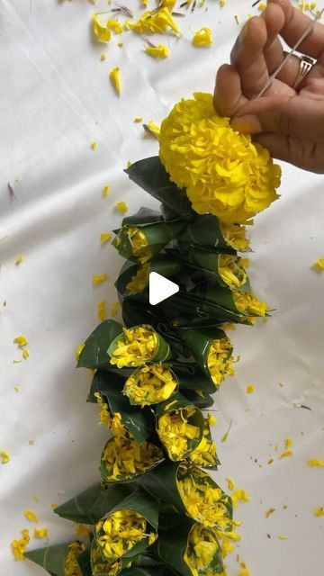 Harika Reddy on Instagram: "Day 22 of 60 Festive DIYs Magic With Harika 🪷

Toran/ Toranam for festivals using mango leaves and marigolds ✨🪔🌼

Save and share this idea with someone whom you find useful🤝

#repost

| DIY series, DIY, crafts, festive decor, Ganesh Chaturthi decor, Ganesh Chaturthi decor ideas, ugadi decor, toranam for festivals, Diwali, Diwali decor, Diwali 2023, home decor, Indian festival, toran, mango leaf toran, mango leaves, toranam, festive toran, festive toranam, festive hangings, flower hangings, marigold crafts, mango leaves crafts, eco-friendly, sustainable, sustainable living |" Diwali Home Decor With Flowers, Diwali Decoration With Leaves, Toran With Flowers, Home Flower Decoration Indian, Rangoli Near Tulsi Plant, Dipawali Decoration Craft, Mango Leaves Decoration Ideas, Flower Diwali Decoration, Diwali Decorations At Home With Flowers