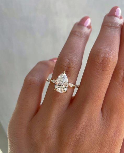 Cullen Jewellery | Custom Engagement Rings | Pear solitaire with accent band? YES PLEASE✨⁠ ⁠ A gorgeous customised version of our Jacinta engagement ring💍⁠ ⁠ Would you say yes to this … | Instagram Wedding Rings Art, Pear Wedding Ring, Promise Rings Vintage, Eternity Engagement Ring, Moissanite Vs Diamond, Halo Wedding Ring, Ring Rosegold, Future Engagement Rings, Art Deco Wedding Rings