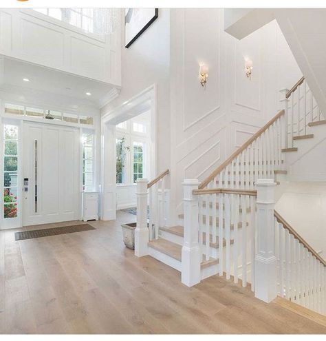 Neutral Foyer with millwork Casa Country, Dream House Rooms, House Goals, Dream House Plans, Staircase Design, Wood Flooring, Stairs Design, Pretty House, Property Listing