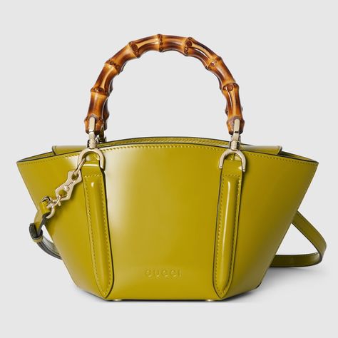 Shop the Mini bamboo top handle tote bag in yellow at GUCCI.COM. Enjoy Free Shipping and Complimentary Gift Wrapping. Gucci Mini, Bamboo Top, Iphone Pro, Gucci Bamboo, Dark Khaki, Louis Vuitton Shoulder Bag, Small Wallet, Black Tote Bag, Green Leather