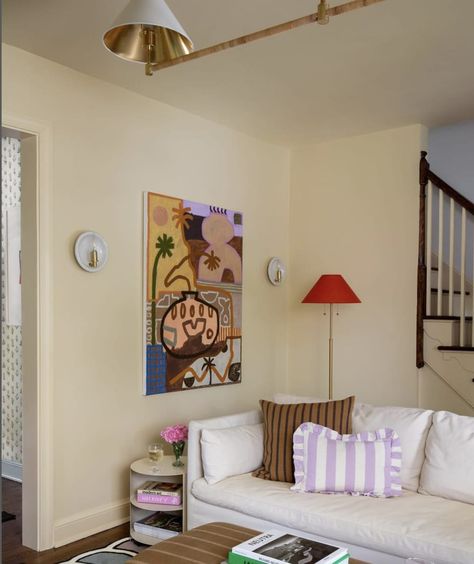 A butter yellow-drenched living room painted in Farrow’s Cream by Farrow & Ball. Butter Yellow Sofa, Cream Walls Interior Design, Creamy Yellow Walls, Yellow Cream Walls Living Room, Apricot Walls Living Room, Living Room Wall Color Yellow, Edinburgh Interior Design, Cream Walls Interior, Soft Yellow Living Room Walls